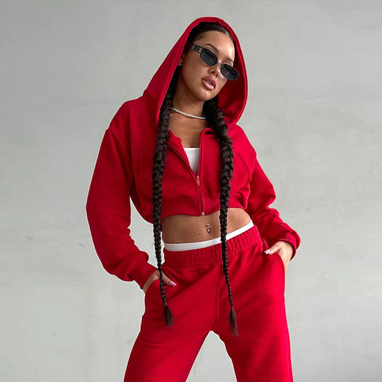 Damen kurzes Zip-Kapuzensweatshirt mit tailliertem Bündchen und weitem High‑Waist French‑Terry Jogginghose Set Shop Nory