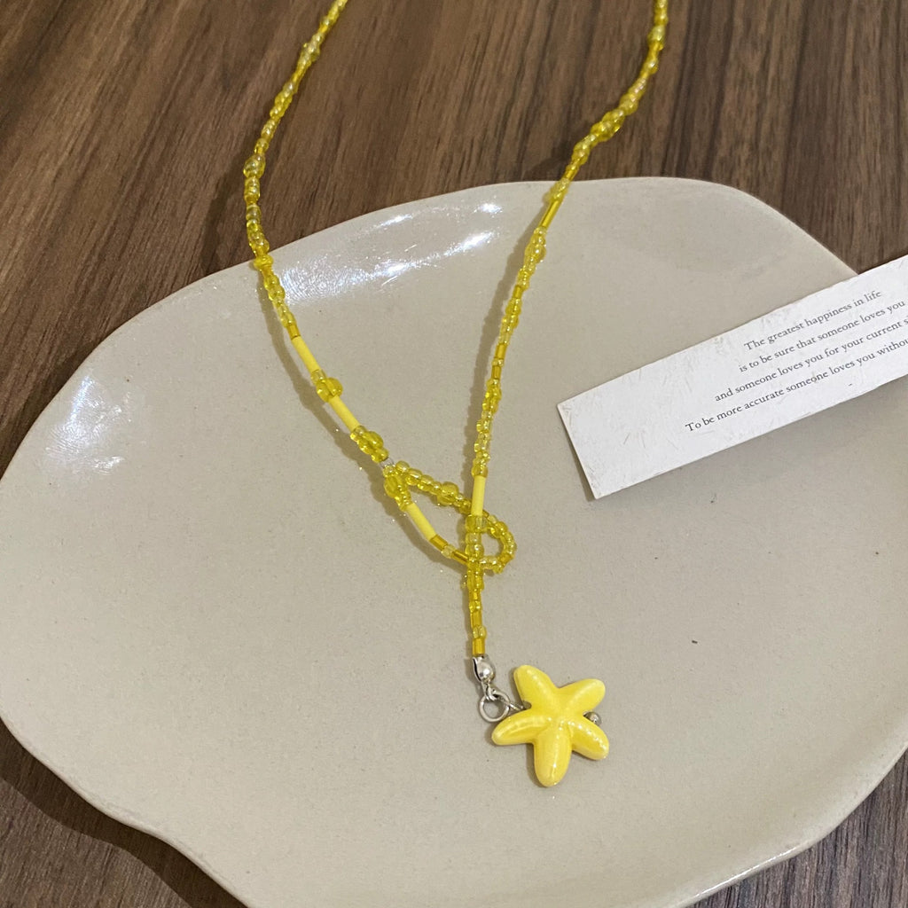 Damen Kette mit handgefertigtem Blumenanhänger Shop Nory