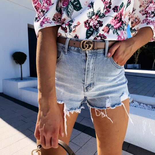 Damen Denim-Shorts mit fransigen Säumen Shopnory