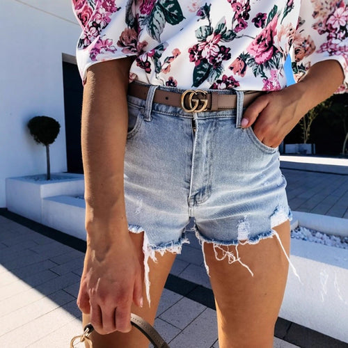 Damen Denim-Shorts mit fransigen Säumen Shopnory