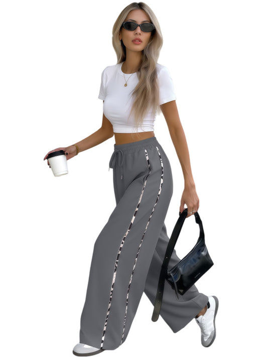 Damen Weite High‑Waist Loungehose mit Kordelzug und kontrastierenden Seitenstreifen Shop Nory