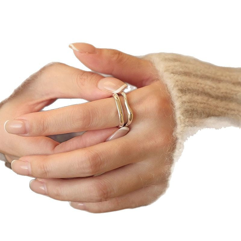 Damen Eleganter und geschwungener Silberring mit minimalistischer Ästhetik Shop Nory