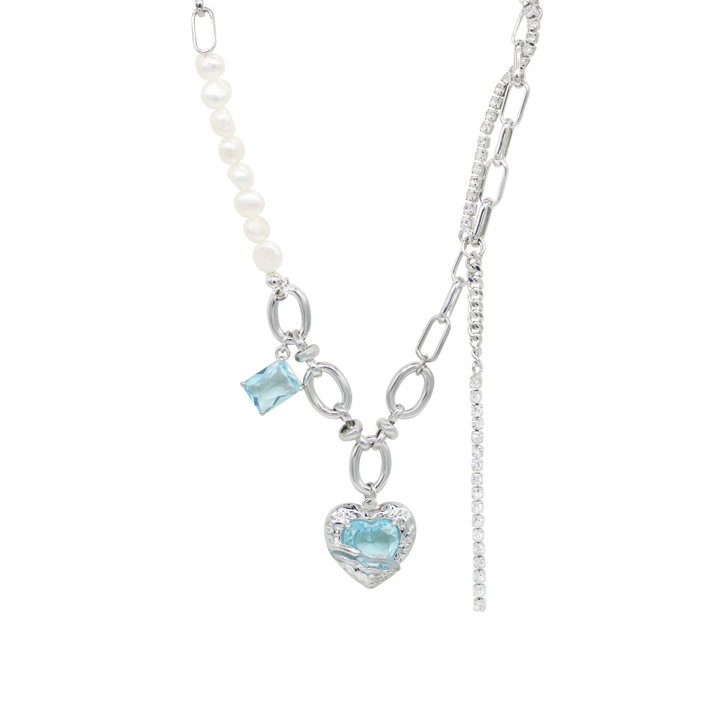 Damen Luxusarmband mit funkelnden Zirkonia und eleganten Perlendetails Shop Nory