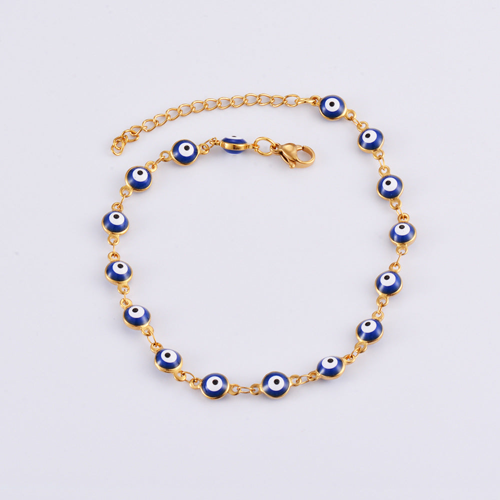 Damen Armband mit schützenden Augenmotiven und feinem Goldglanz Shop Nory