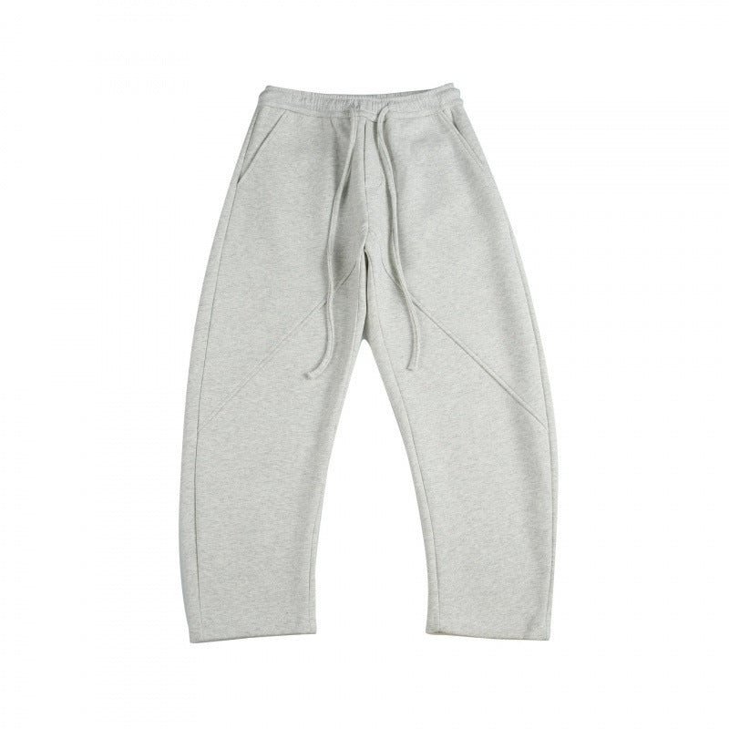 Unisex Weite Tech-Jogginghose mit diagonalem Nahtdesign, Elastikbund und Tunnelzug Shop Nory