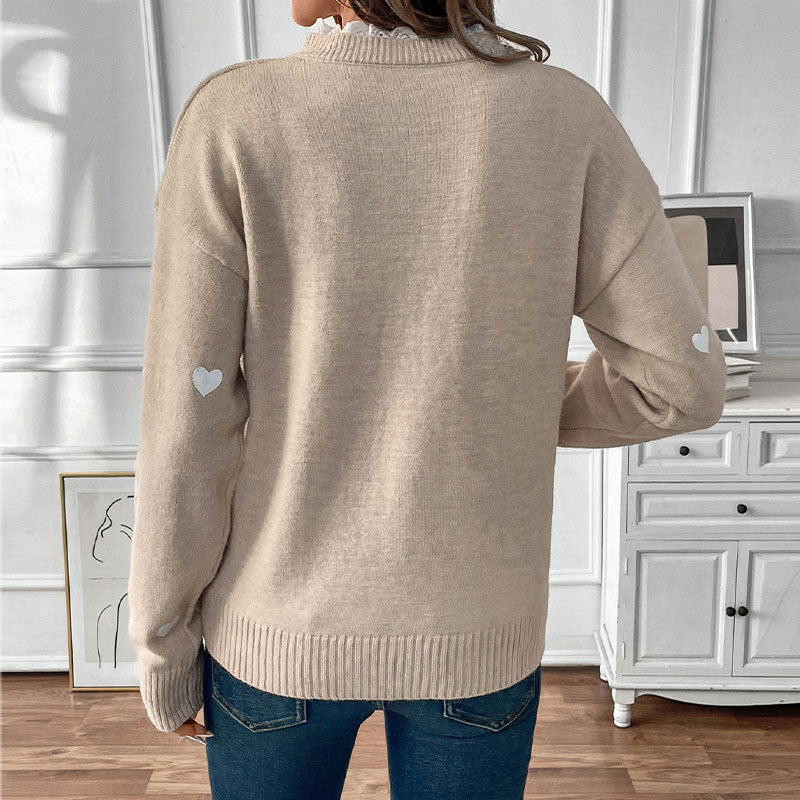 Damen V‑Ausschnitt Feinstrickpullover mit Herz‑Intarsien und gerippten Bündchen Shop Nory