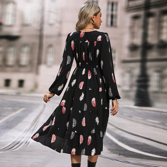 Damen Midikleid mit V-Ausschnitt, dreiviertel Ärmeln, Stufenrock und Federmuster Shop Nory