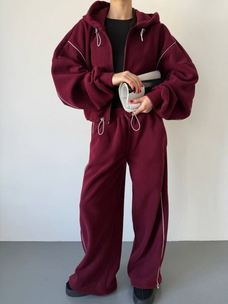Damen gekürztes Zip-Hoodie mit Tunnelzug und hochgeschnittener weiter Fleece-Loungehose Shop Nory