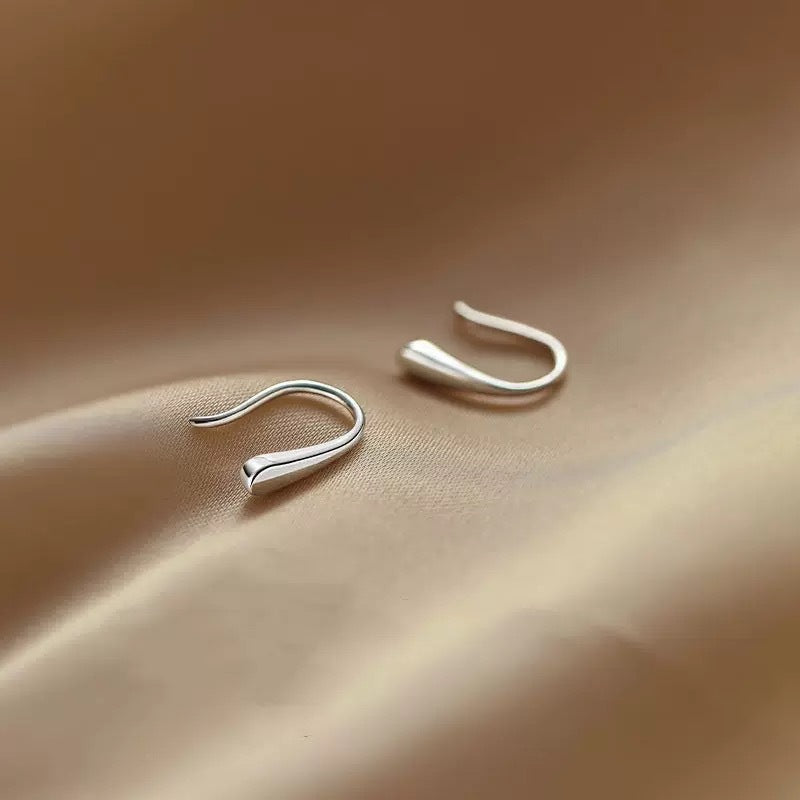 Damen Ohrhänger mit skulpturalem Design und filigraner Verarbeitung Shop Nory