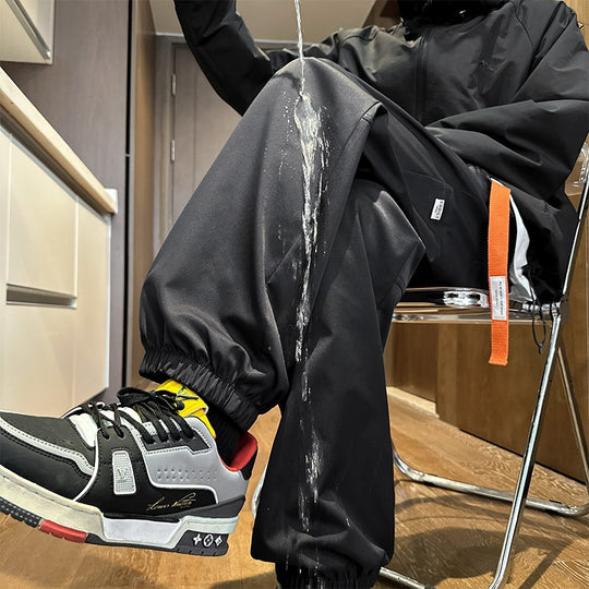 Herren Wasserabweisende Tech-Jogginghose mit elastischem Saum, Kordelzug und robusten Nähten Shop Nory