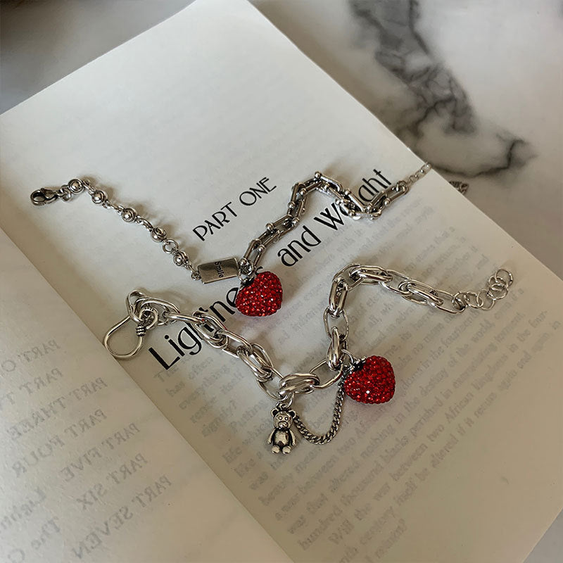 Damenarmband mit herzförmigem Anhänger und funkelnden Details Shop Nory