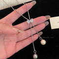 Damen Y-förmige Kette mit funkelndem Kristall- und eleganten Perlenanhängern Shop Nory
