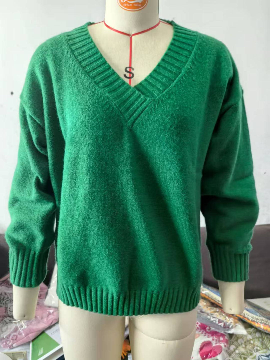 Damen nan Oversized V-Ausschnitt Strickpullover mit gerippten Bündchen Shop Nory