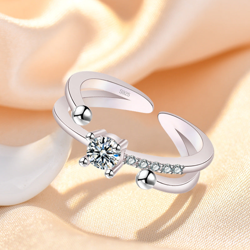 Damenring mit elegantem Wellenmuster und funkelnden Zirkonia Shop Nory