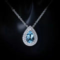 Damen zarte Halskette mit tropfenförmigem Aquamarin-Anhänger und funkelndem Zirkonia Shop Nory