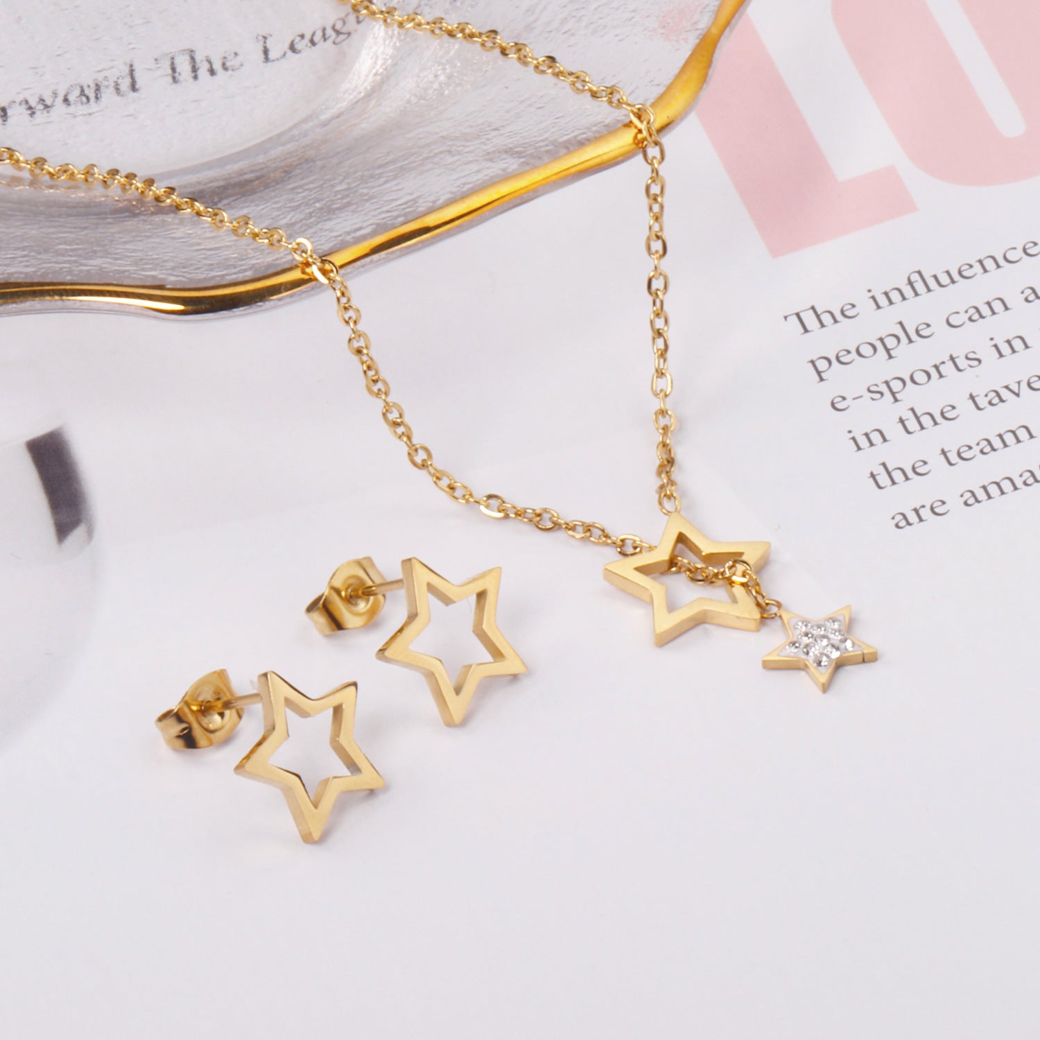 Damen Schmuckset mit goldplattierten Sternanhängern und funkelnden Zirkonia Shop Nory