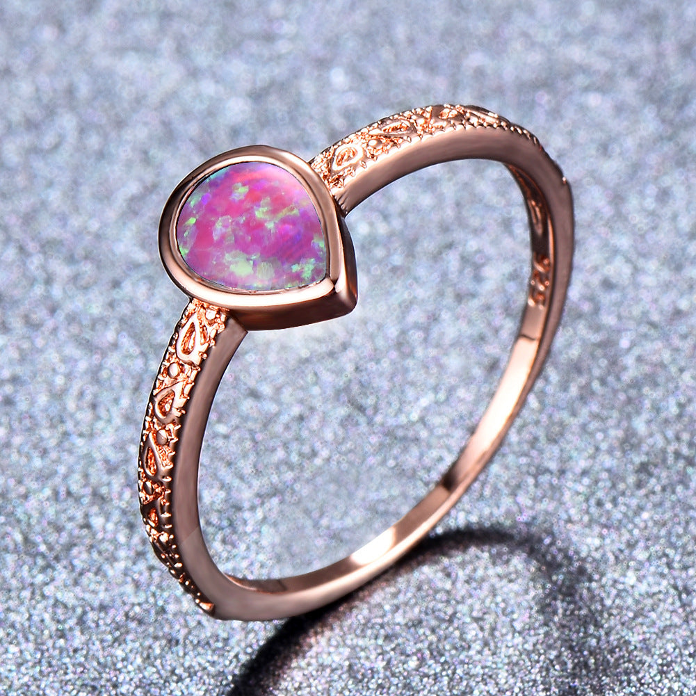 Damen Ring mit tropfenförmigem Opal und filigraner Zirkonia-Verzierung Shop Nory