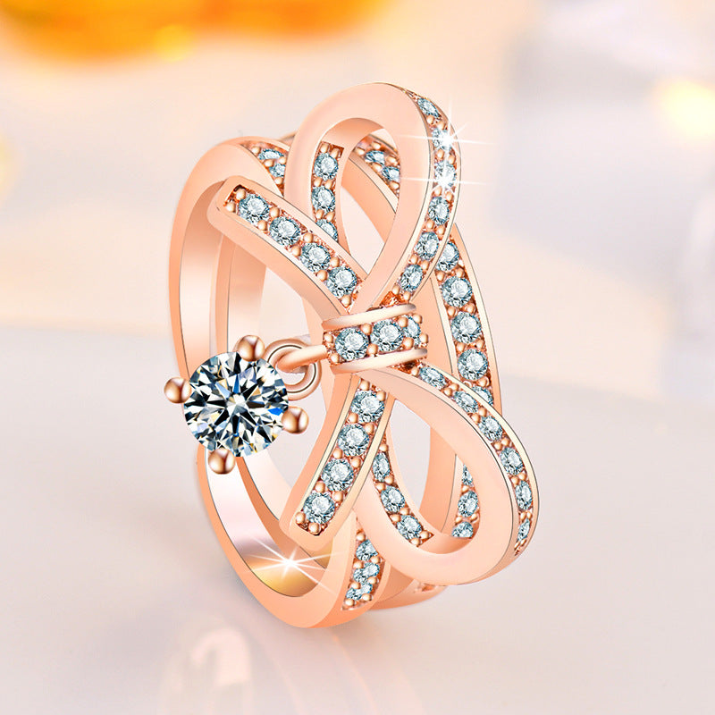 Damen Offener Ring mit kunstvollem Schleifen-Design und funkelndem Zirkonia Shop Nory