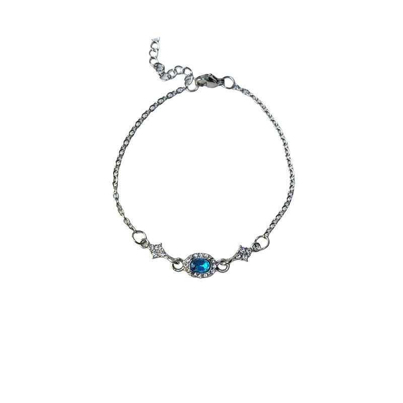 Zierliches Armband mit Ovaler mittelfassung und Zirkonia-Details