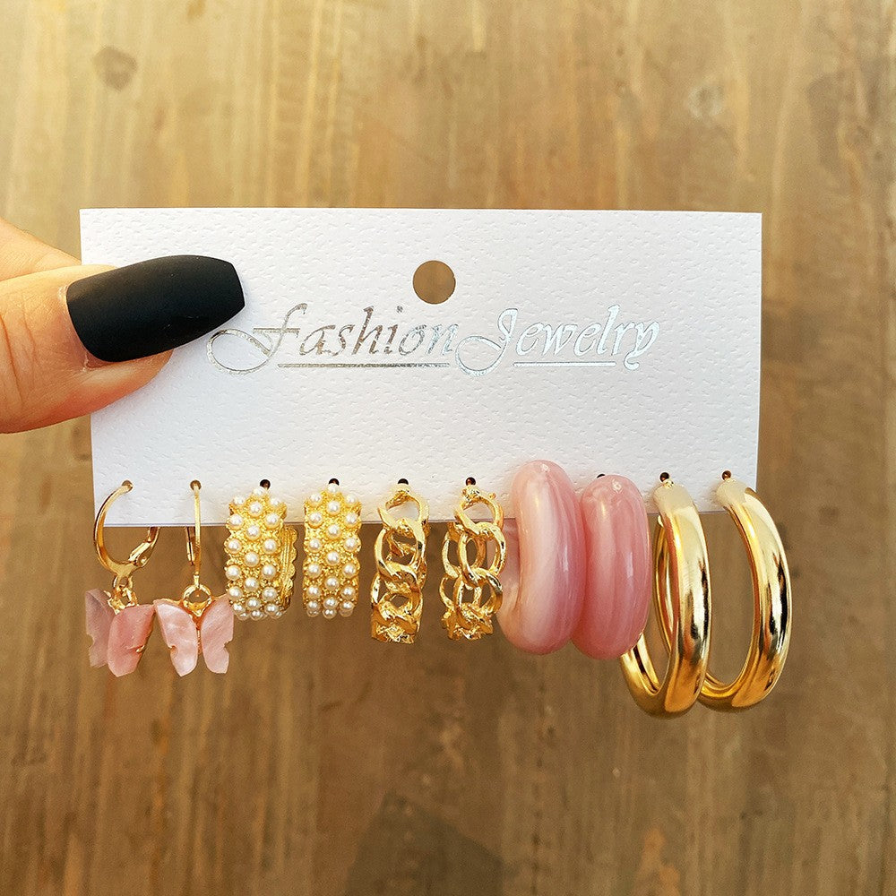 Damen Ohrringe Set mit elegantem Perlendesign und funkelnden Goldakzenten Shop Nory