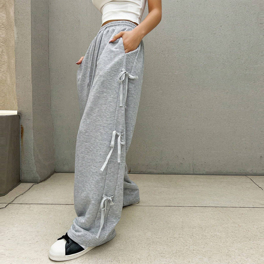 Damen lockere Wide‑Leg Loungehose mit elastischem Bund, Kordelzug und seitlichen Zierschleifen Shop Nory