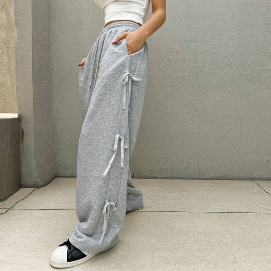 Damen lockere Wide‑Leg Loungehose mit elastischem Bund, Kordelzug und seitlichen Zierschleifen Shop Nory