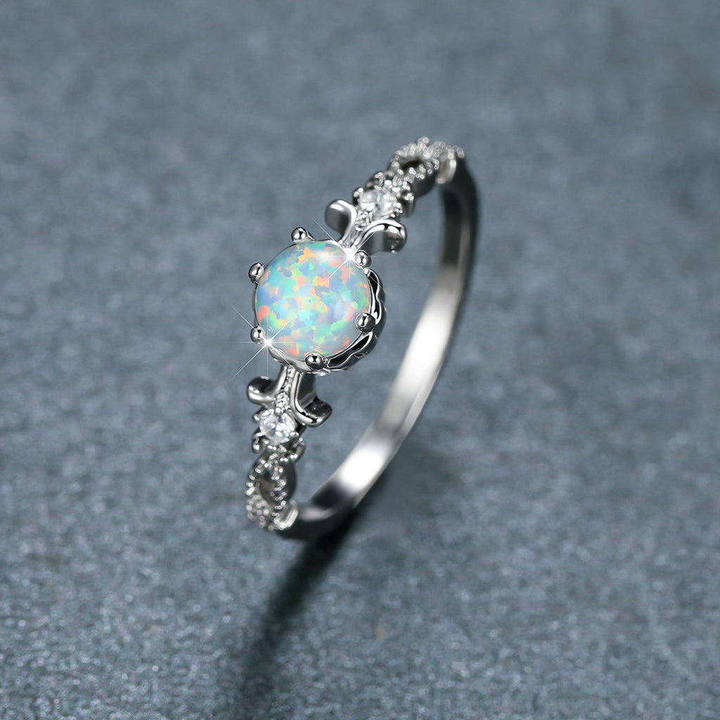 Damen Schmuckring mit opalisiertem Stein und filigranem Design Shop Nory