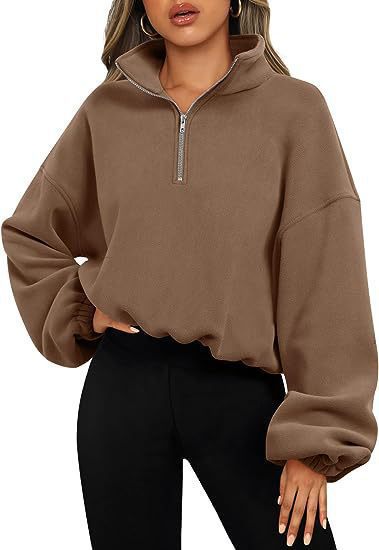 Damen nan kurz geschnittenes Halbzip-Sweatshirt mit hohem Stehkragen, Ballonärmeln und elastischem Saum Shop Nory