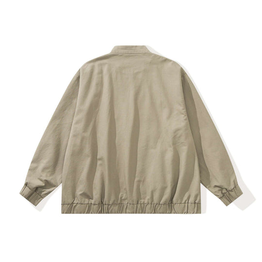 Unisex Kastig geschnittene Canvas‑Zipjacke mit Stehkragen, Tunnelzugsaum und Utility‑Taschen Shop Nory
