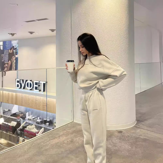 Damen hochgeschnittene Jogginghose mit elastischem Rüschenbund, tapered Bein und gerippten Knöchelbündchen Shop Nory