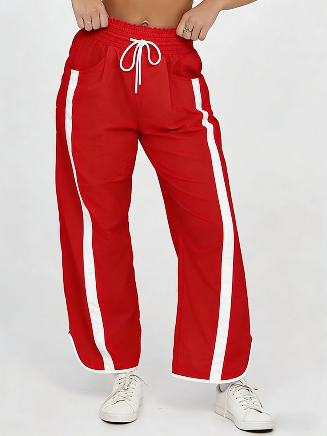 Damen nan relaxte Trackpants mit seitlichem Kontraststreifen, elastischem Smokbund und Eingrifftaschen Shop Nory