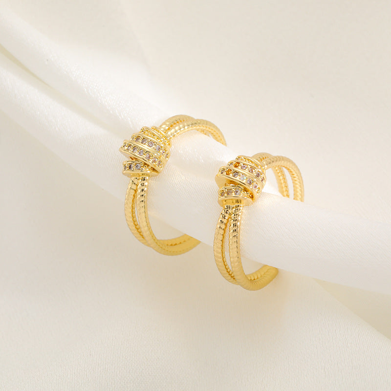 Damen Ring mit kunstvollem, mehrschichtigem Design und Zirkonia-Applikationen Shop Nory