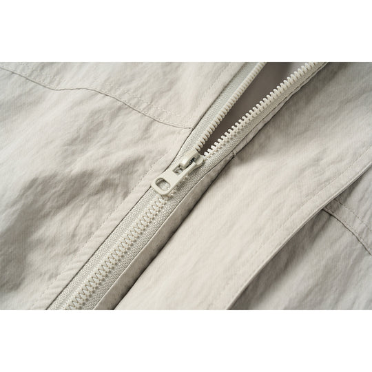 Unisex Kurzblouson im minimalistischen Workwear‑Look mit hohem Stehkragen und Druckknopfverschluss Shop Nory