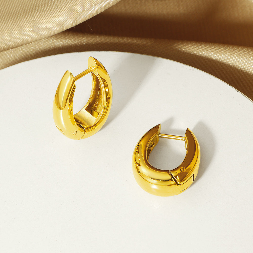 Damen Skulpturale Gold Creolen Shop Nory