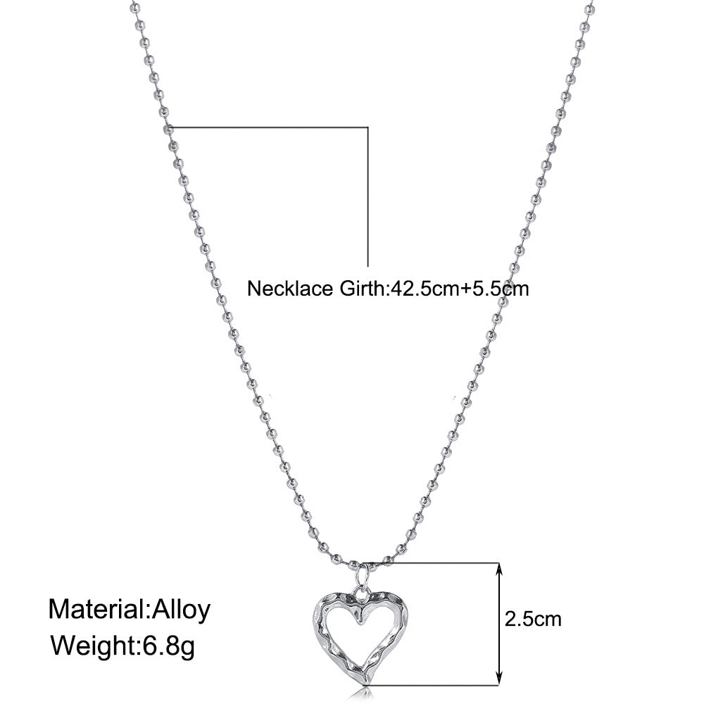 Damen Halskette mit verspieltem Herzanhänger und feinem Gliederdesign Shop Nory