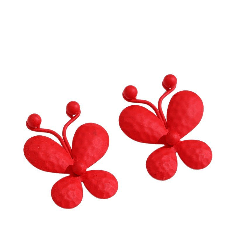Damen Ohrclips mit kunstvollem Blumenmuster Shop Nory