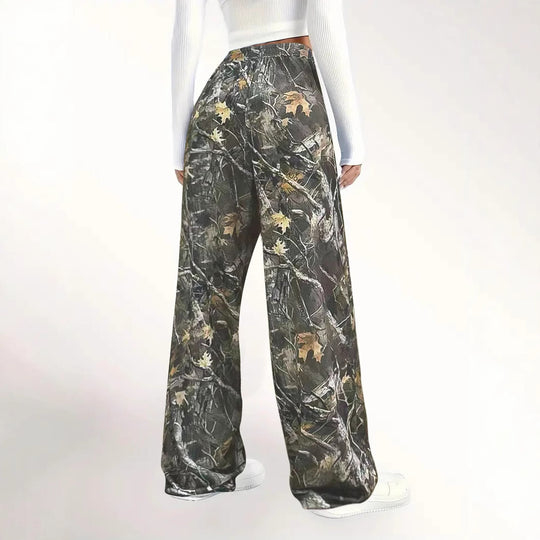 Damen Weite Palazzo-Loungehose im Camouflage-Blattmuster mit Elastikbund, Tunnelzug und Eingrifftaschen Shop Nory