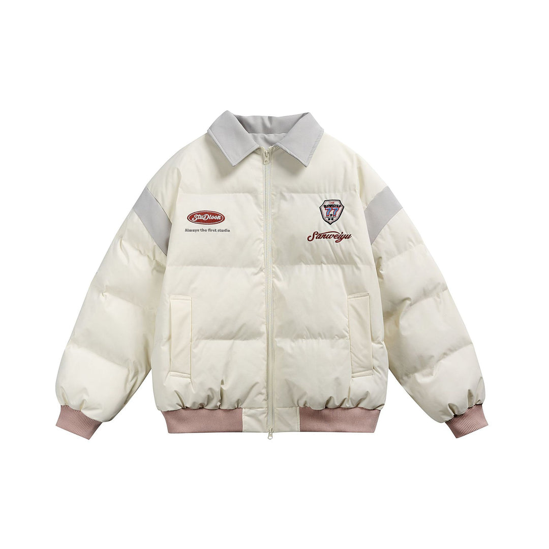 Damen Kurz geschnittene wattierte Blousonjacke mit kontrastierendem Kragen und Stickdetails Shop Nory