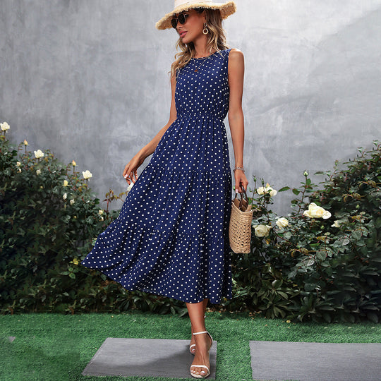 Damen Maxikleid mit Punkten und voluminösem Saum Shopnory