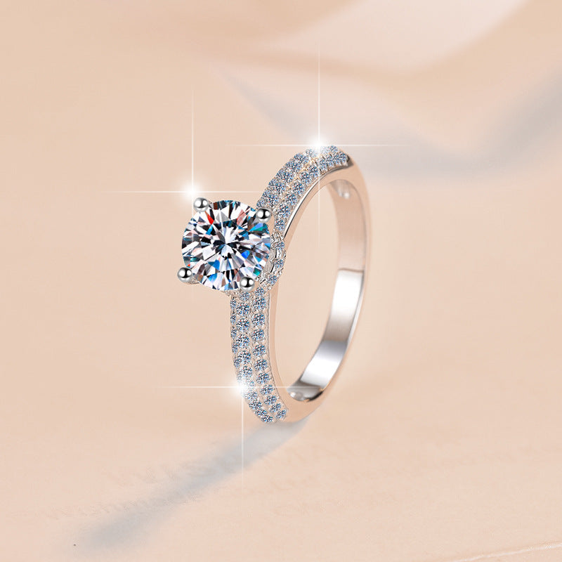 Damen Verlobungsring mit strahlendem Zirkonia und filigraner Detailverzierung Shop Nory