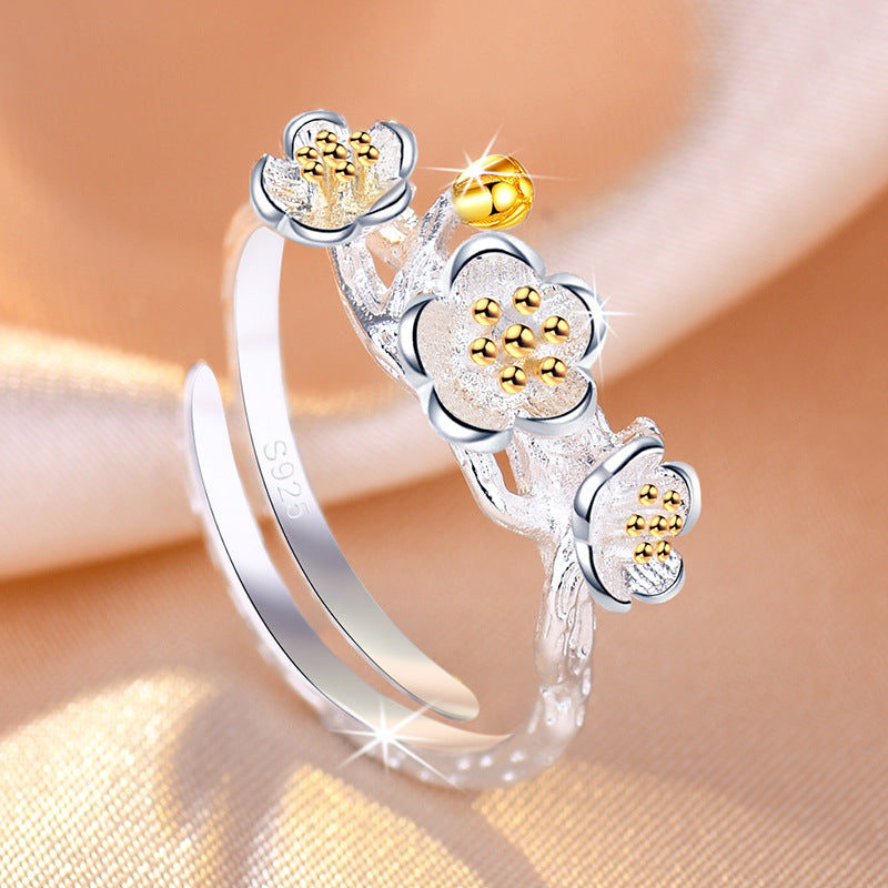 Damenring mit kunstvollem Blumenmuster und elegantem Zirkonia-Besatz Shop Nory