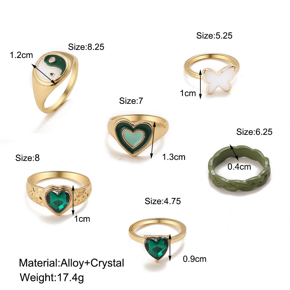 Damen modisches Mehrfach-Ringset mit bunten und symbolischen Designs Shop Nory
