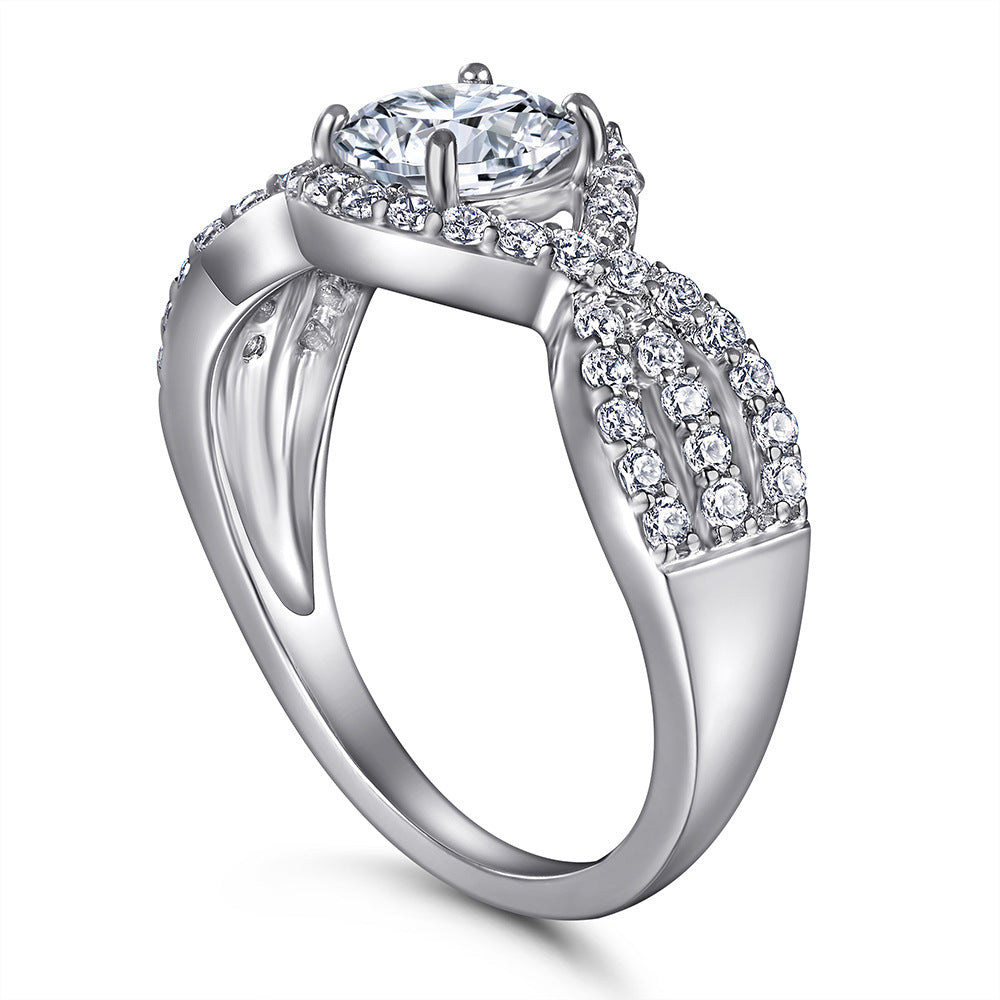 Damen eleganter Verlobungsring mit kunstvollem Design und funkelnden Zirkonia Shop Nory