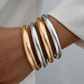 Damen Armreif-Set aus fein polierten Metalllegierungen Shop Nory