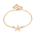 Damen Armband mit maritimem Seestern-Design und zarten Perlenakzenten Shop Nory