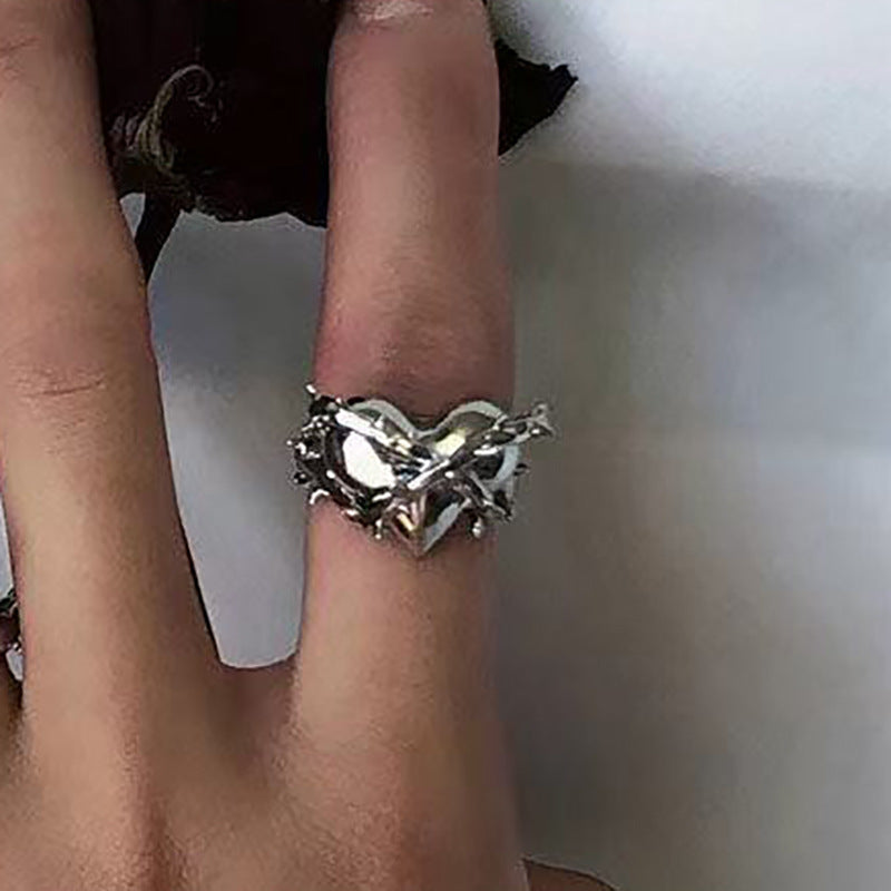 Damen Schmuckring mit filigranem Herzdesign und elegantem Zweigdetail Shop Nory