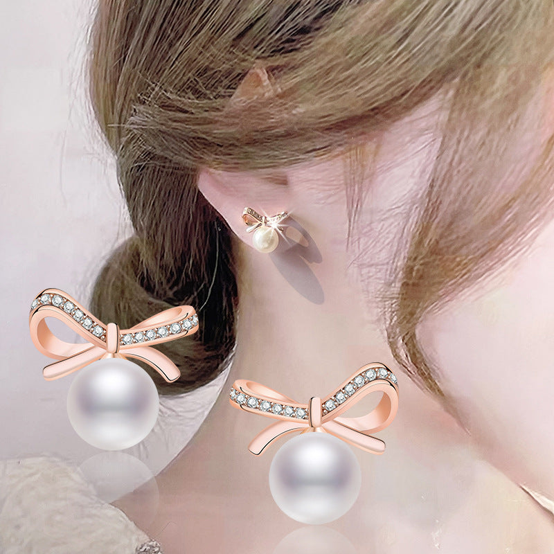 Damen Ohrringe mit Perlendesign und funkelnden Zirkonia Shop Nory