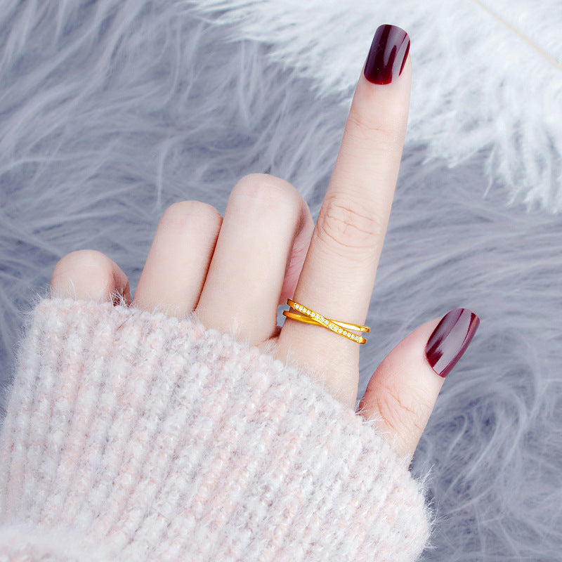 Damen eleganter Ring mit geflochtenem Design und funkelnden Zirkonia-Steinen Shop Nory
