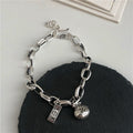 Damen-Armband mit kunstvoll gestaltetem Anhänger aus hochwertigem Metall Shop Nory