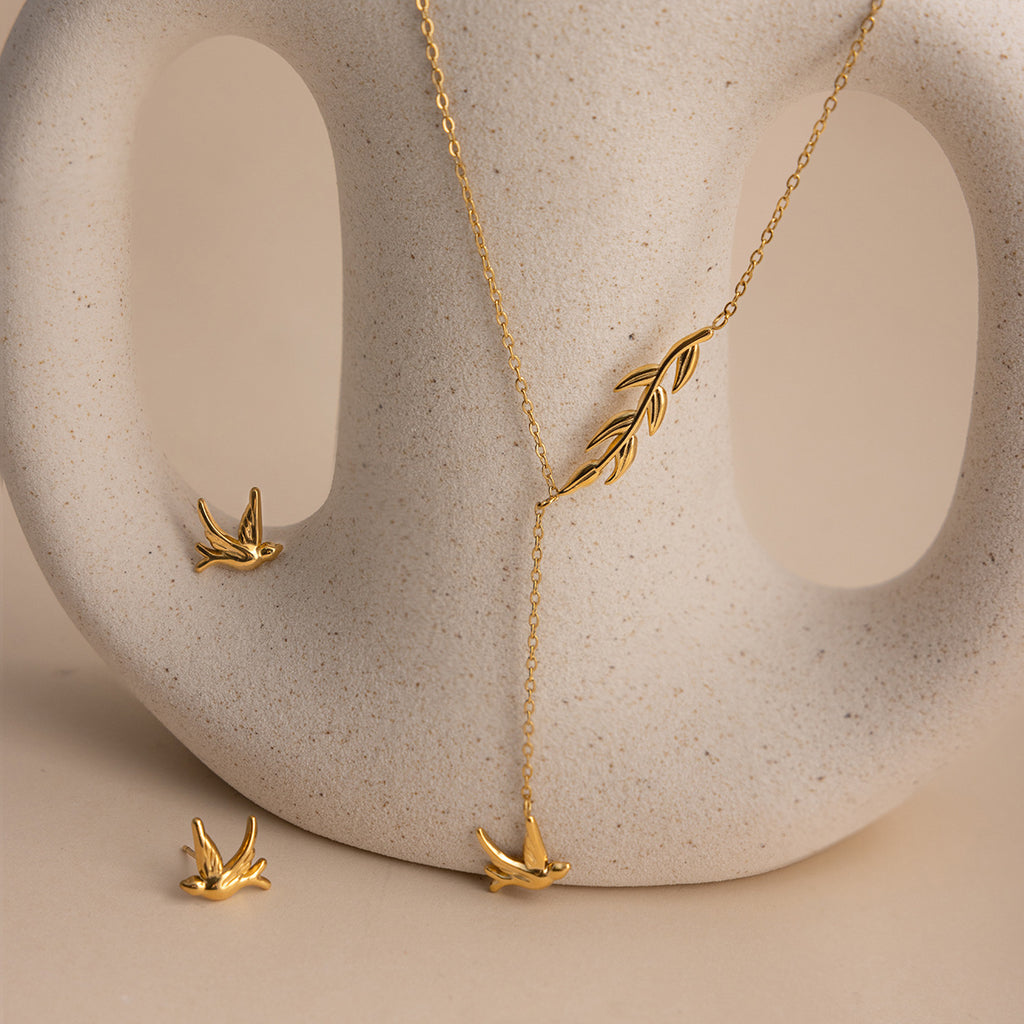 Damen Halskette mit Anhänger im eleganten Vogel-Design aus hypoallergenem Edelstahl Shop Nory